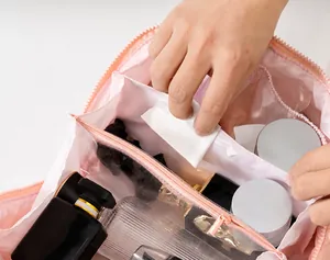 Close-up of the spacious interior compartments of a pink waterproof cosmetic bag