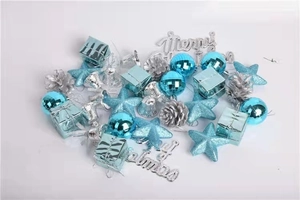 Detailed top view of sky blue and silver Christmas tree ornaments set on white background