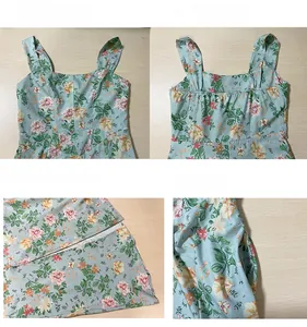 Detail view of light blue floral dress showing square neckline, fabric texture and side pocket