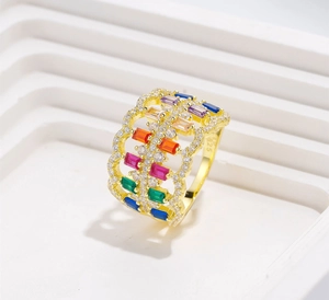 Detail of S925 silver gold-plated ring with colorful gemstones and pavé zircon stones