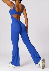 Detail of royal blue yoga jumpsuit showing scrunch butt design and flared leg fit