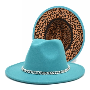 Teal fedora hat with silver chain and leopard print lining on flat brim wool felt