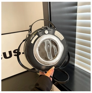 Unique washing machine style round handbag with silver trim and creative lettering details