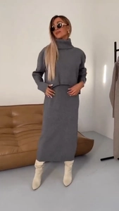 Dark grey two-piece knit sweater set with turtleneck top and long straight skirt