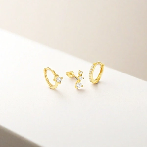Macro shot of S925 sterling silver hallmarks on gold-plated turquoise set earrings