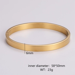 Detailed view of 6mm wide gold brushed metal bangle with 58x50mm inner diameter