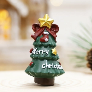 Miniature resin Christmas tree figurine with red bow and Merry Christmas text