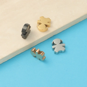 Polished stainless steel boy and girl shaped charms in gold, silver, black, and rose gold