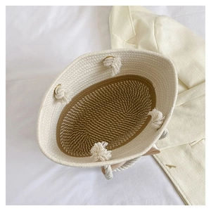 Top view showing the spacious dual-tone beige and brown interior of the woven tote bag