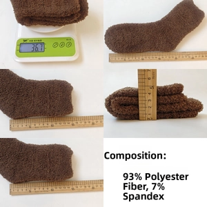 Detailed view of dark brown coral fleece socks showing 36.7g weight and measurement specs