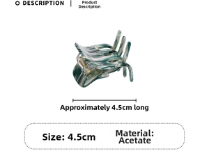 Detail view of 4.5cm acetate hair claw with green and white marble pattern design