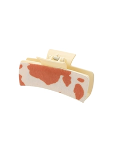 Rectangle hair claw clip with beige frame and brown cow print pattern leather inlay