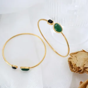 Vintage gold-plated titanium steel bracelet with green and black onyx oval stones