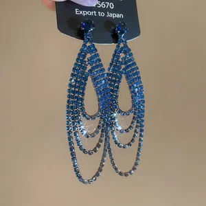 Boucles d'oreilles élégantes bleu roi à pampilles en strass et franges de cristal