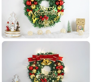 Detail showing a lit Christmas wreath with Merry Christmas sign and golden ornaments