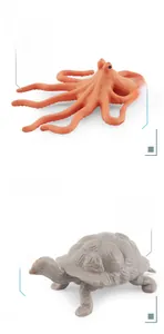 Detailed view of realistic orange octopus and grey tortoise figures with smooth texture