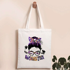 White Halloween canvas tote bag with Momster print and spooky skull pumpkin motifs