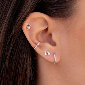 Minimalist silver 18k plated copper snake studs and C-shaped ear cuffs set on model