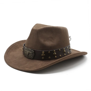 Detail of dark brown faux suede western cowboy hat featuring steer head buckle and studs