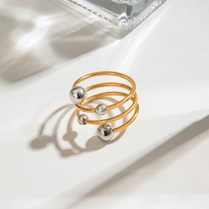 Three-layer 18k gold plated stainless steel spiral ring with silver ball accents