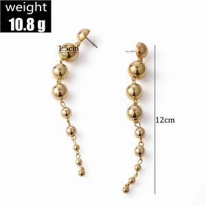 Detail view of 12cm gold ball drop earrings with weight and size measurement labels