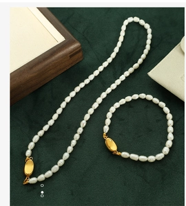 Baroque freshwater pearl necklace and bracelet set with golden magnetic pea-shaped clasps