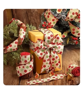 Close-up of Christmas ribbon with glitter polka dots and red wire edge for DIY decor