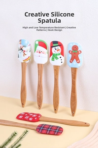 Christmas silicone spatula set with wooden handles and festive character patterns