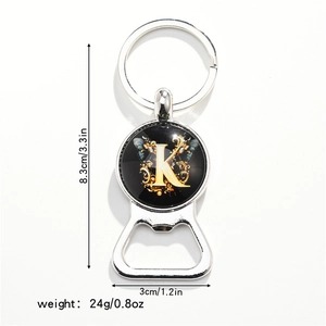 Detail view of butterfly bottle opener keychain with letter K showing dimensions 8.3x3cm
