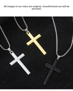 Detailed macro view of three minimalist cross necklaces in silver, gold, and matte black steel