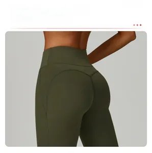 Detail view of high-waist yoga leggings featuring curved back seams for bum lifting effect