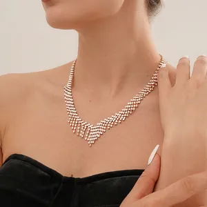 Sparkling crystal tassel necklace with V-shaped rhinestone fringe for women
