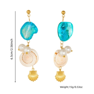 Marine shell and pearl drop earrings featuring irregular blue stones and gold scallop pendant