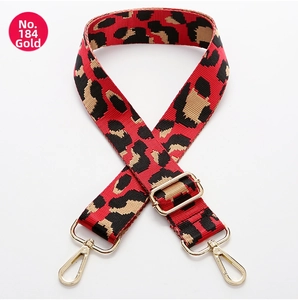 Close-up of No.184 red leopard print nylon strap with gold metal hooks for handbags