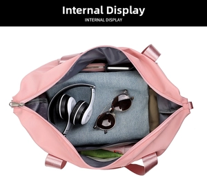 Internal display of large pink travel bag with compartments for clothes and sunglasses