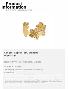 Close-up of golden five-petal flower cuff bracelet with radial texture and alloy finish