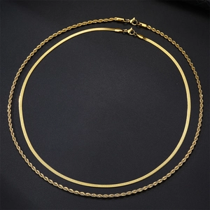 Detail of 18k gold plated stainless steel herringbone and twisted rope chain necklace set