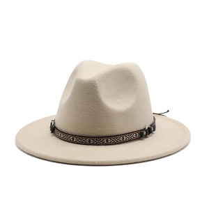 Close-up of beige wool fedora hat with ethnic woven band and silver metal ring detail