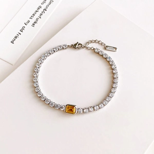 Pulsera tenis minimalista de acero inoxidable con circonitas blancas y piedra amarilla rectangular