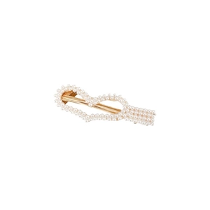 Elegant gold metal hair clip featuring white faux pearl heart patterns on white background