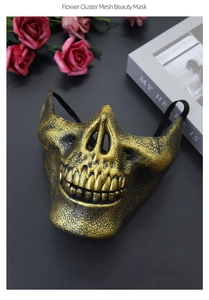 Detail of vintage gold skull mask with intricate cracks and realistic bone texture