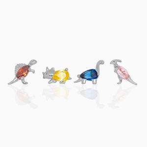 Detailed macro view of four silver dinosaur stud earrings with colorful zircon stones