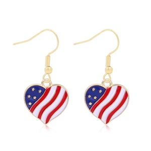 Detailed view of heart-shaped earrings featuring US flag enamel on polished gold metal hook