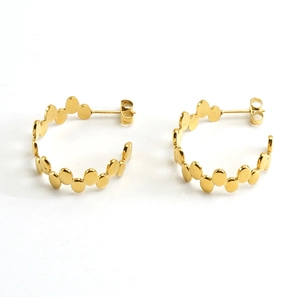 Detailed view of irregular 18k gold plated stainless steel hoop earrings in a link design
