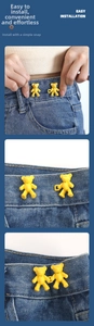 Detail view of bear-shaped yellow waist buckles for adjusting denim jeans size