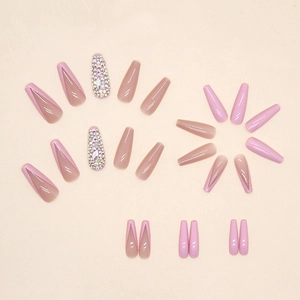 French style glitter press-on nails with pink V-tip and rhinestones on beige background