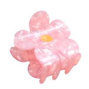 Pink floral acetate hair claw clip with pearlescent finish and yellow center for women