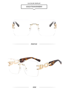 Detailed close-up of golden rimless square glasses with tortoiseshell patterned temples