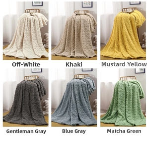 Detailed grid of plush fleece blankets showing embossed patterns in six neutral colors