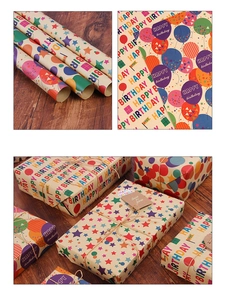 Detail of Happy Birthday kraft wrapping paper with colorful letters and starry patterns